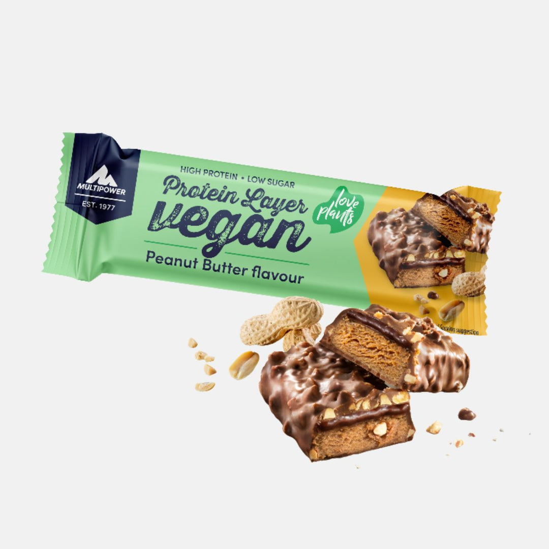 Multipower Vegan Protein Layer Riegel 55g – pflanzlicher Proteinriegel mit cremigem Erdnussgeschmack und softem Kern, 100 % vegan.